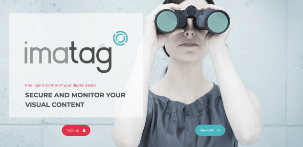 Woman using binoculars representing digital asset management and security.