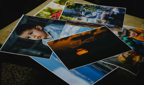 Colorful photography prints highlighting artistic expression and industry trends.