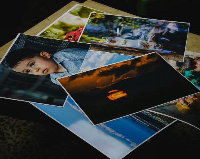 Colorful photography prints highlighting artistic expression and industry trends.