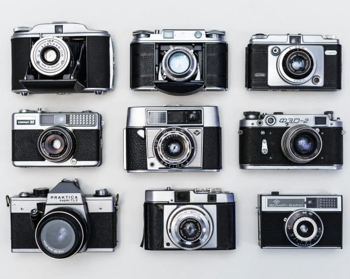 Collection of nine classic film cameras showcasing retro design and craftsmanship.