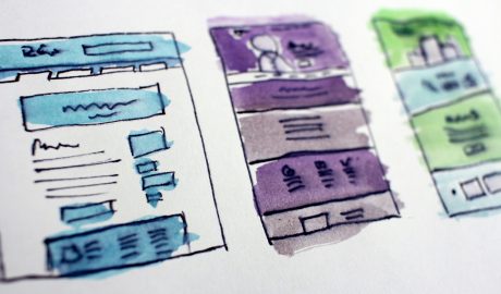 Colorful sketches of website wireframes for design exploration.